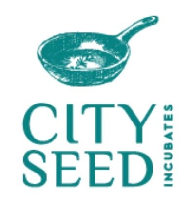 Logo of City Seed Incubates featuring a teal cast-iron skillet above the text.